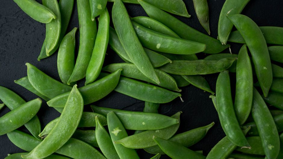Fresh green peas in pods